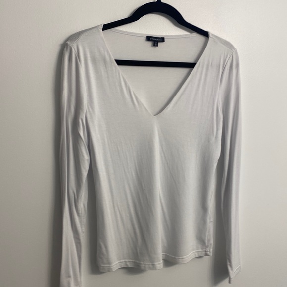 White long-sleeve shirt with v-neck. - Picture 1 of 1